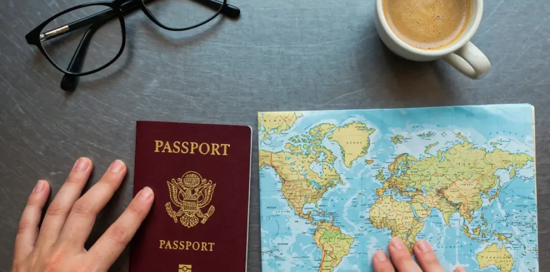 planning-journey-with-passport-world-map-coffee